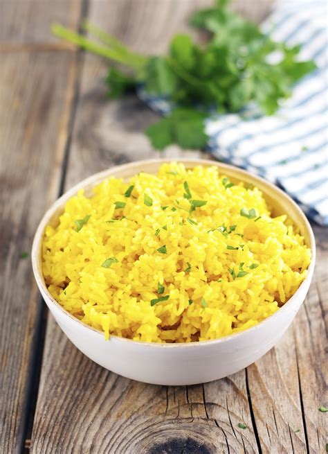How can I make turmeric rice more flavorful?